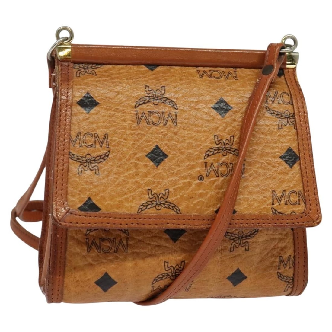 MCM Logogram Vicetos Shoulder Bag Brown Gold PVC Leather: MCM Logogram Vicetos Shoulder Bag Brown Gold PVC Leather The MCM Logogram Vicetos Shoulder Bag is a stylish accessory crafted from durable PVC leather, featuring an elegant brown and gold exterior. Th