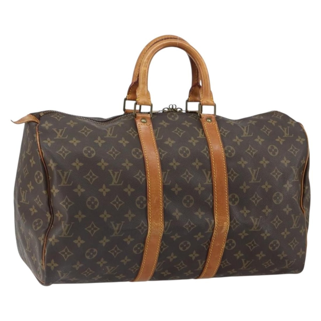 Keepall 45 Monogram Canvas Boston Bag by Louis Vuitton M41428: Keepall 45 Monogram Canvas Boston Bag by Louis Vuitton M41428 This Louis Vuitton Monogram Keepall 45 Boston Bag showcases the brand's iconic monogram canvas exterior and classic design. The bag featur