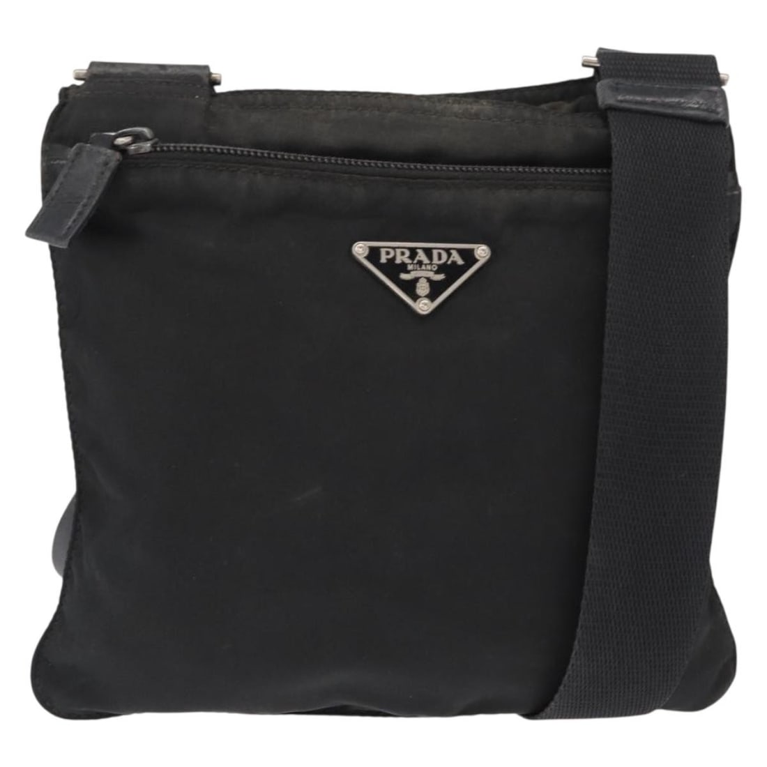 PRADA Black Silver Nylon Shoulder Bag Made in Italy Authentic: PRADA Black Silver Nylon Shoulder Bag Made in Italy Authentic This PRADA Shoulder Bag is a stylish accessory crafted in Italy, featuring a sleek nylon exterior in black and silver. The bag measures ap