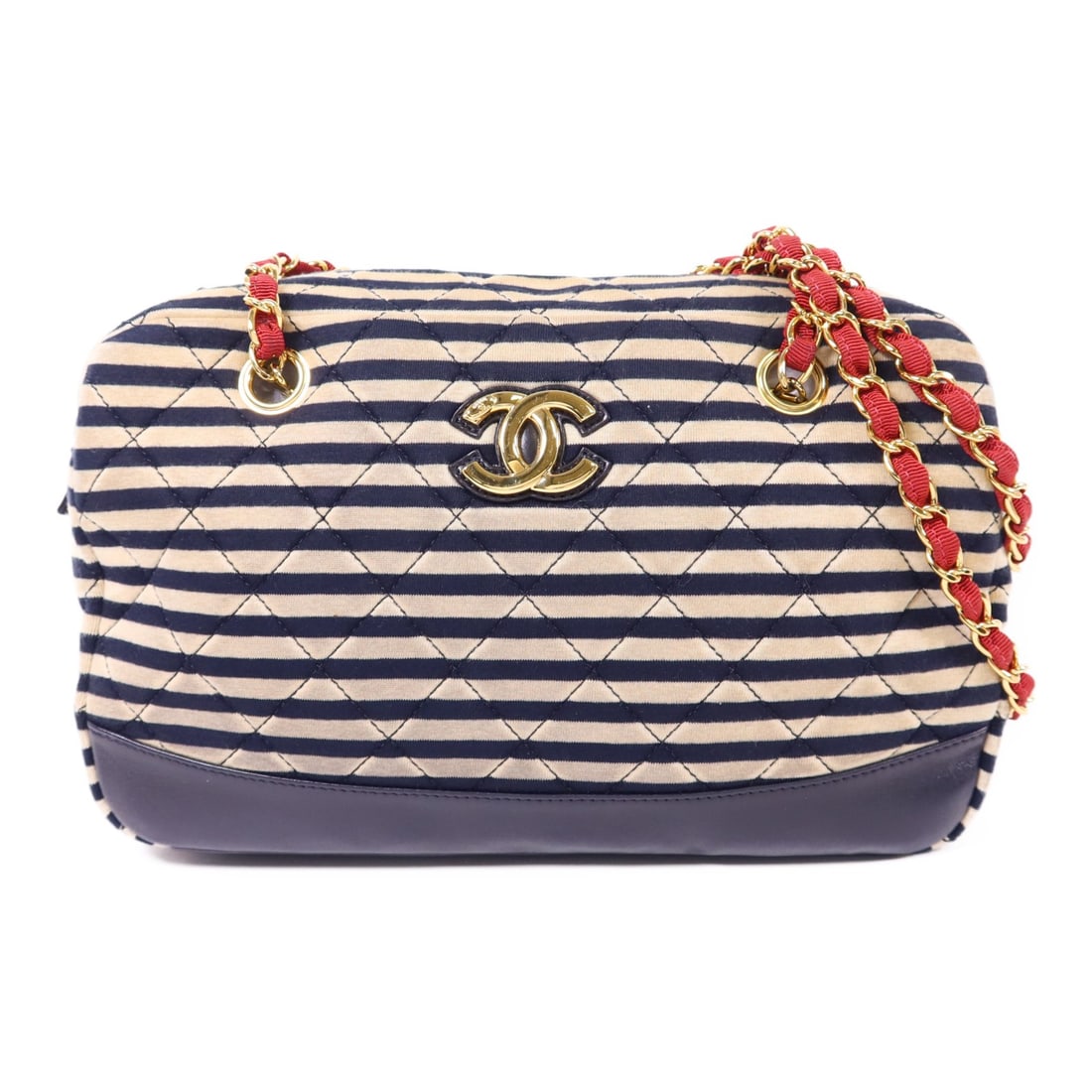 Navy Blue and Beige Fabric Chanel CC Shoulder Bag with Chain Strap: Navy Blue and Beige Fabric Chanel CC Shoulder Bag with Chain Strap This CHANEL shoulder bag features a navy blue and beige fabric exterior with a classic CC design. The bag is equipped with a chain st