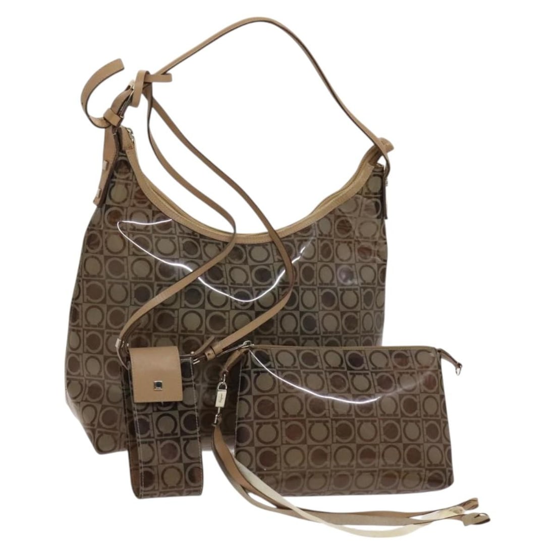 Salvatore Ferragamo Brown Vinyl Hand Bag Set Authentic: Salvatore Ferragamo Brown Vinyl Hand Bag Set Authentic This elegant Salvatore Ferragamo handbag set features a stylish brown vinyl exterior, showcasing the luxury craftsmanship synonymous with the bra