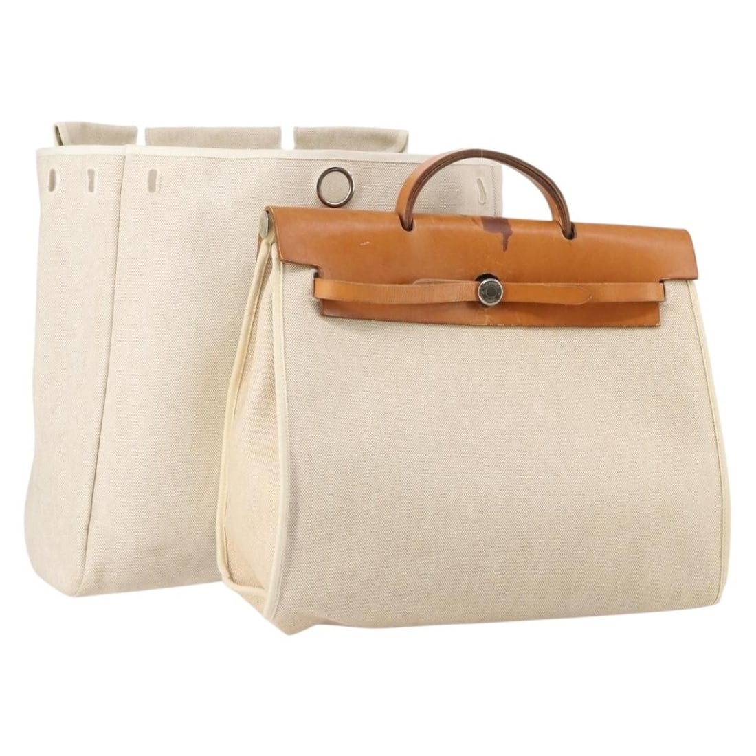 HERMES Tower Ash MM Hand Bag Coated Canvas Beige France: HERMES Tower Ash MM Hand Bag Coated Canvas Beige France This HERMES Tower Ash Her MM Hand Bag showcases a refined design crafted from durable coated canvas in a sophisticated beige hue. Measuring appr