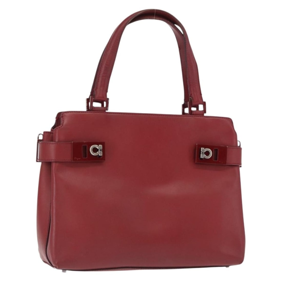 Red Leather Gancini Wanda Handbag by Salvatore Ferragamo Silver Hardware: Red Leather Gancini Wanda Handbag by Salvatore Ferragamo Silver Hardware This Salvatore Ferragamo Gancini Wanda handbag features a red leather exterior with silver-tone accents. Designed with a struct