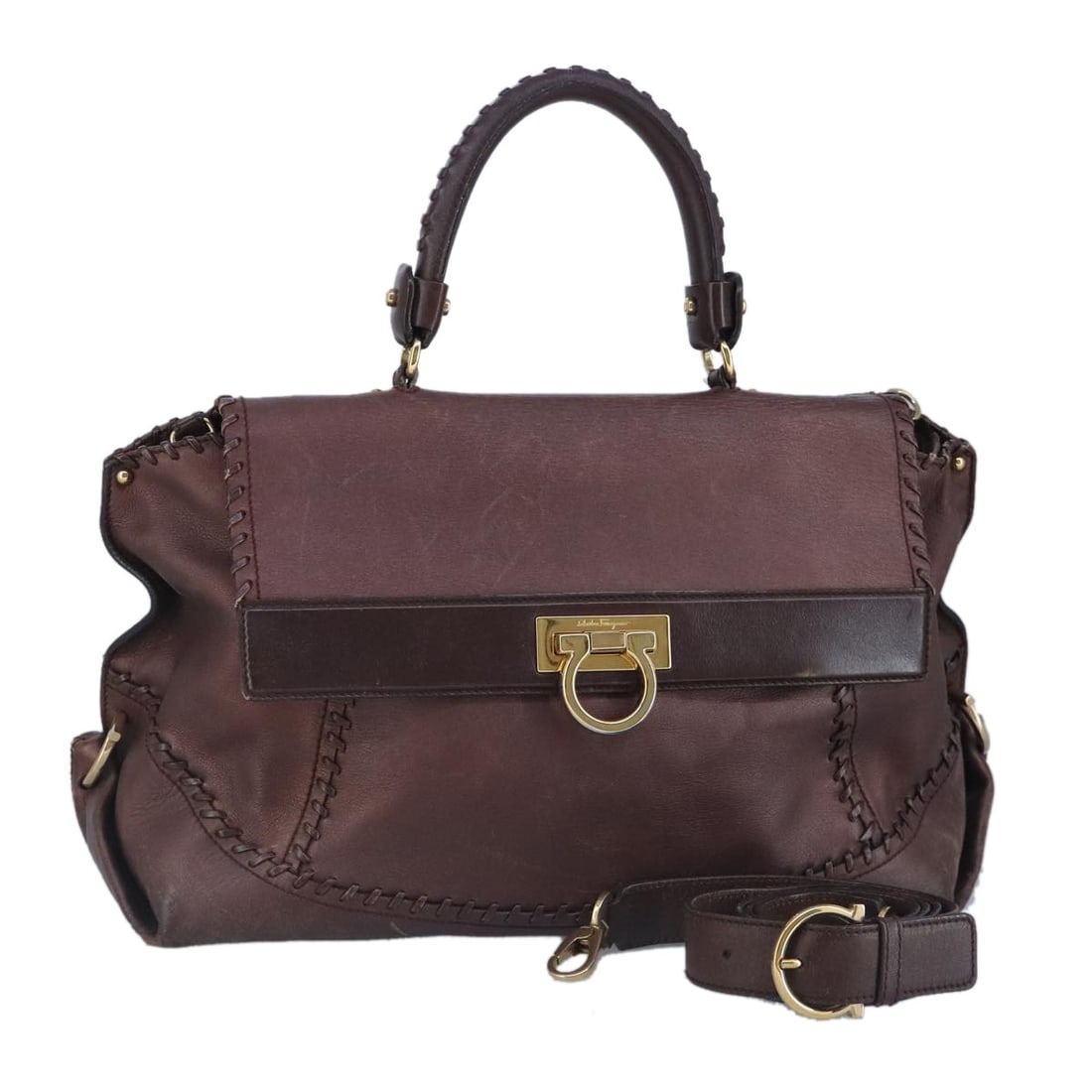 Salvatore Ferragamo Gancini Sofia Leather Hand Bag Brown Gold Auth Italy: Salvatore Ferragamo Gancini Sofia Leather Hand Bag Brown Gold Auth Italy This stylish Salvatore Ferragamo Gancini Sofia Hand Bag showcases a luxurious combination of brown leather with gold accents. M