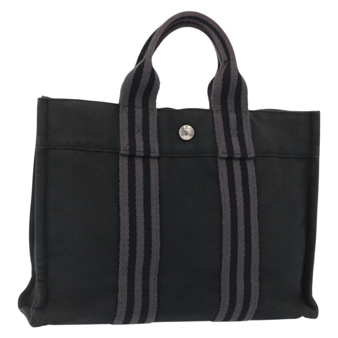 Hermes Fourre Tout PM Canvas Handbag in Silver and Navy: Hermes Fourre Tout PM Canvas Handbag in Silver and Navy This is an Hermes Fourre Tout PM hand bag crafted from canvas in silver and navy tones. The bag features a spacious main compartment with dual t