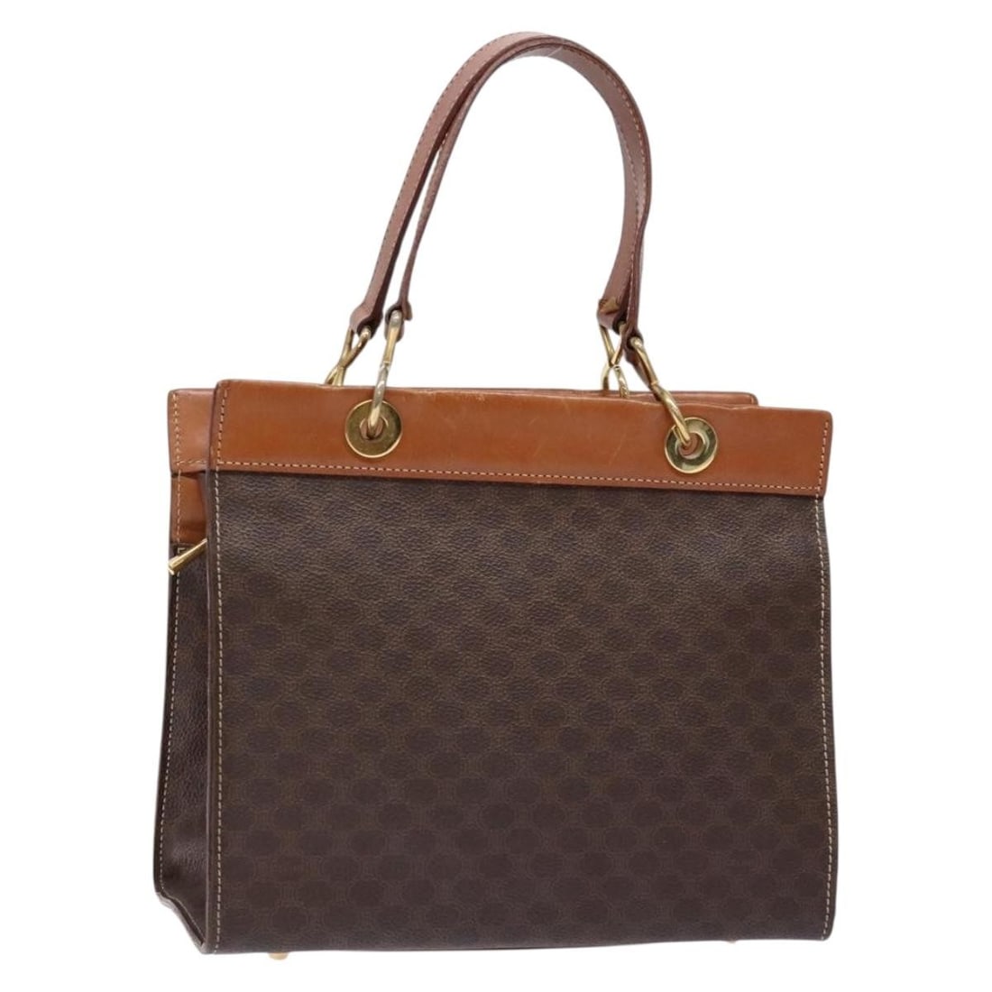 CELINE Macadam Canvas Hand Bag PVC Leather Brown Gold Made in Italy: CELINE Macadam Canvas Hand Bag PVC Leather Brown Gold Made in Italy This authentic CELINE Macadam Canvas Hand Bag showcases a chic blend of brown PVC leather and gold accents, crafted in Italy. The ba