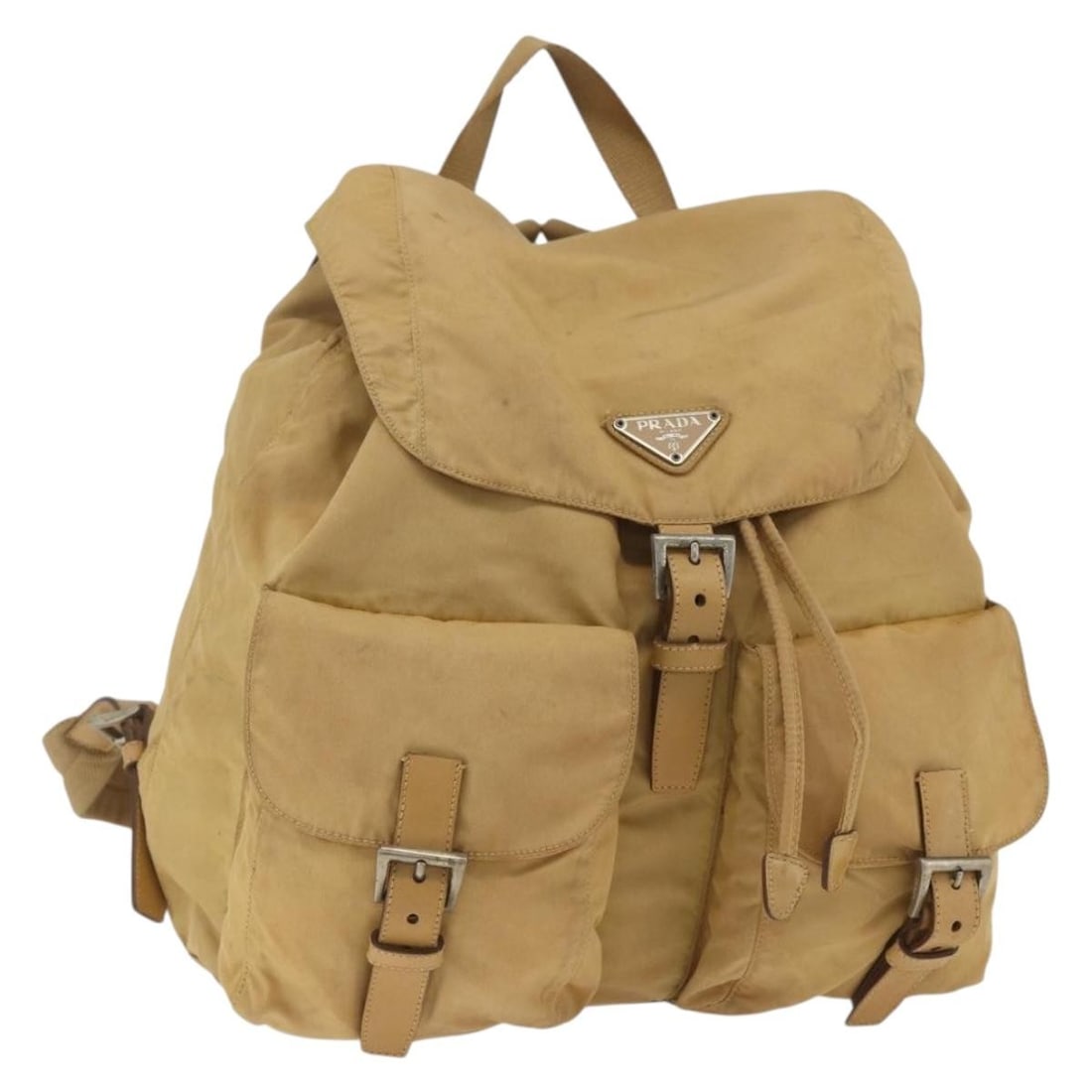 Prada Beige Nylon Backpack with Silver Accents Made in Italy: Prada Beige Nylon Backpack with Silver Accents Made in Italy This is a PRADA backpack crafted from beige nylon with silver accents. The bag features a spacious main compartment and adjustable shoulder