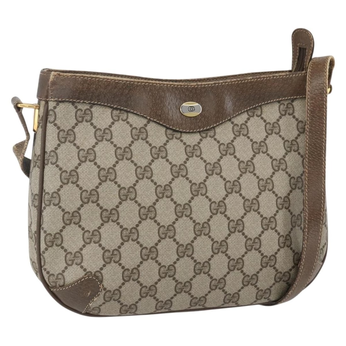 Beige Gold GG Supreme PVC Leather Shoulder Bag by Gucci Italy: Beige Gold GG Supreme PVC Leather Shoulder Bag by Gucci Italy This Gucci GG Supreme shoulder bag features a beige and gold color scheme, crafted from PVC leather and GG canvas. Made in Italy, it offer