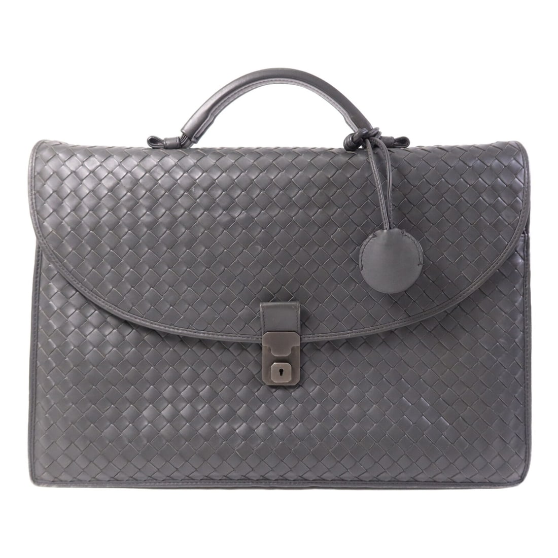 Grey Calfskin Leather Briefcase by Bottega Veneta Italy: Grey Calfskin Leather Briefcase by Bottega Veneta Italy This Bottega Veneta briefcase is crafted from gray calfskin leather, offering a sophisticated and professional appearance. Designed for regular
