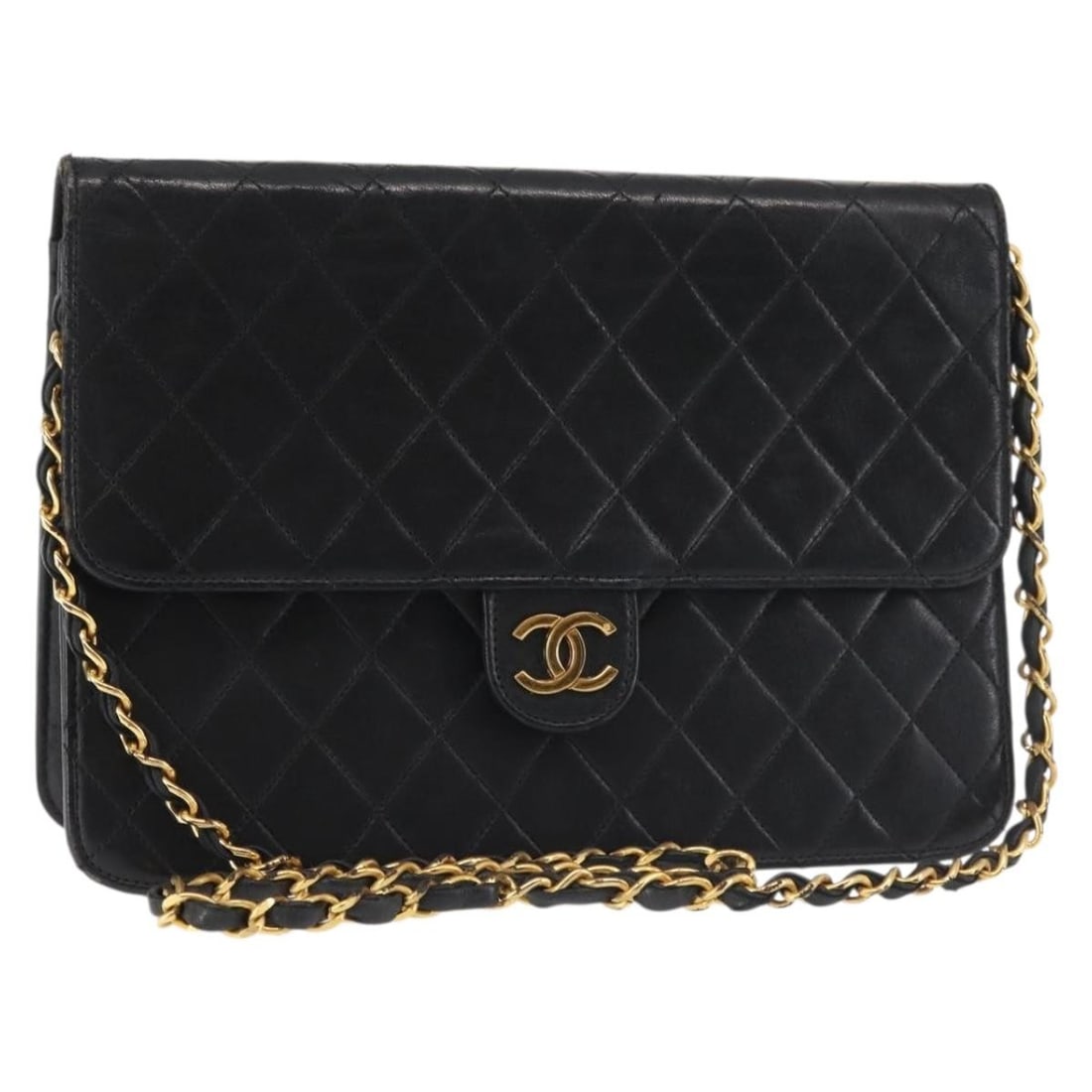Black Lambskin Shoulder Bag by CHANEL with Gold Chain CC Accent: Black Lambskin Shoulder Bag by CHANEL with Gold Chain CC Accent This CHANEL chain shoulder bag features luxurious lambskin leather in a black and gold color combination. Crafted in France, it is desig