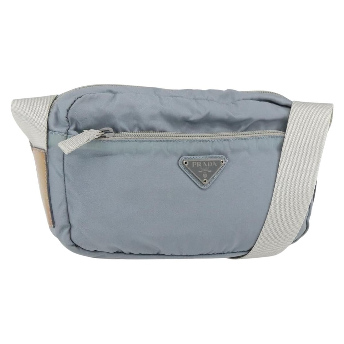 Light Blue Nylon Shoulder Bag by PRADA Silver Accents Italy: Light Blue Nylon Shoulder Bag by PRADA Silver Accents Italy This PRADA shoulder bag features a light blue and silver nylon exterior, offering a stylish and functional accessory. The bag is made in Ita