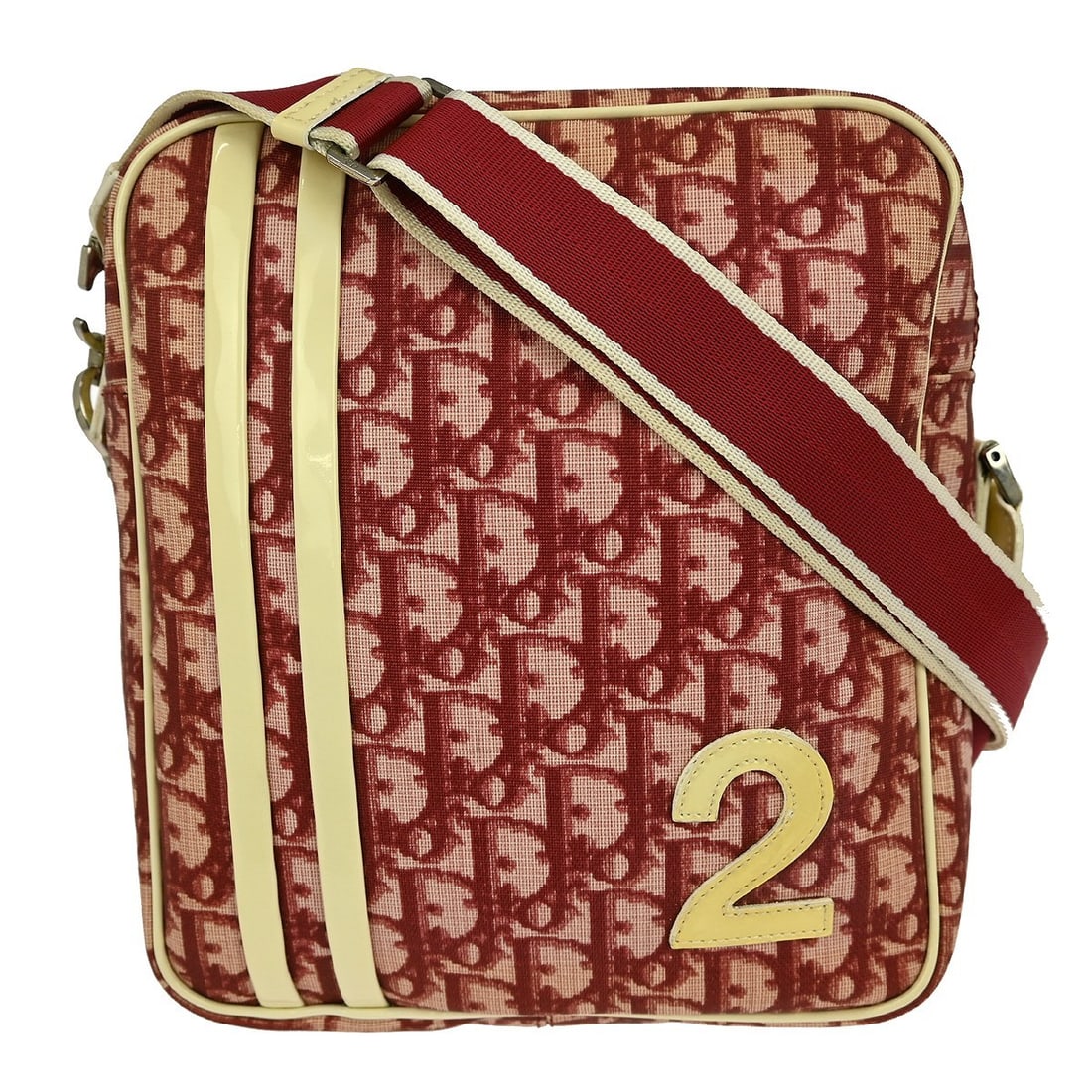 Christian Dior Trotter Red PVC Medium Shoulder Bag MU0071: Christian Dior Trotter Red PVC Medium Shoulder Bag MU0071 This Christian Dior Trotter Shoulder Bag is a stylish accessory ideal for casual occasions. Crafted from red leather PVC, it features the icon