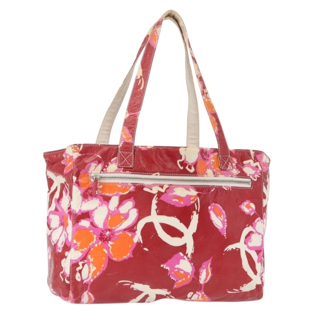 Red Nylon Camelia Tote by CHANEL with CC Logo France: Red Nylon Camelia Tote by CHANEL with CC Logo France This CHANEL Camelia tote bag features a vibrant red nylon exterior and is crafted in France. The bag is designed with a spacious interior and comfo