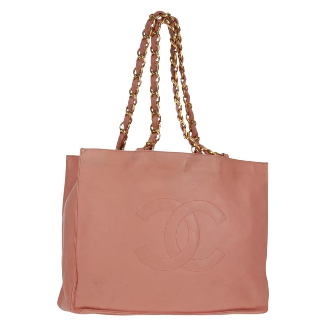 Chanel Pink Lambskin Chain Tote with Gold CC Logo: Chanel Pink Lambskin Chain Tote with Gold CC Logo This CHANEL chain tote bag is crafted from pink lambskin leather with gold-toned accents. The bag features a spacious interior and a classic CC logo d