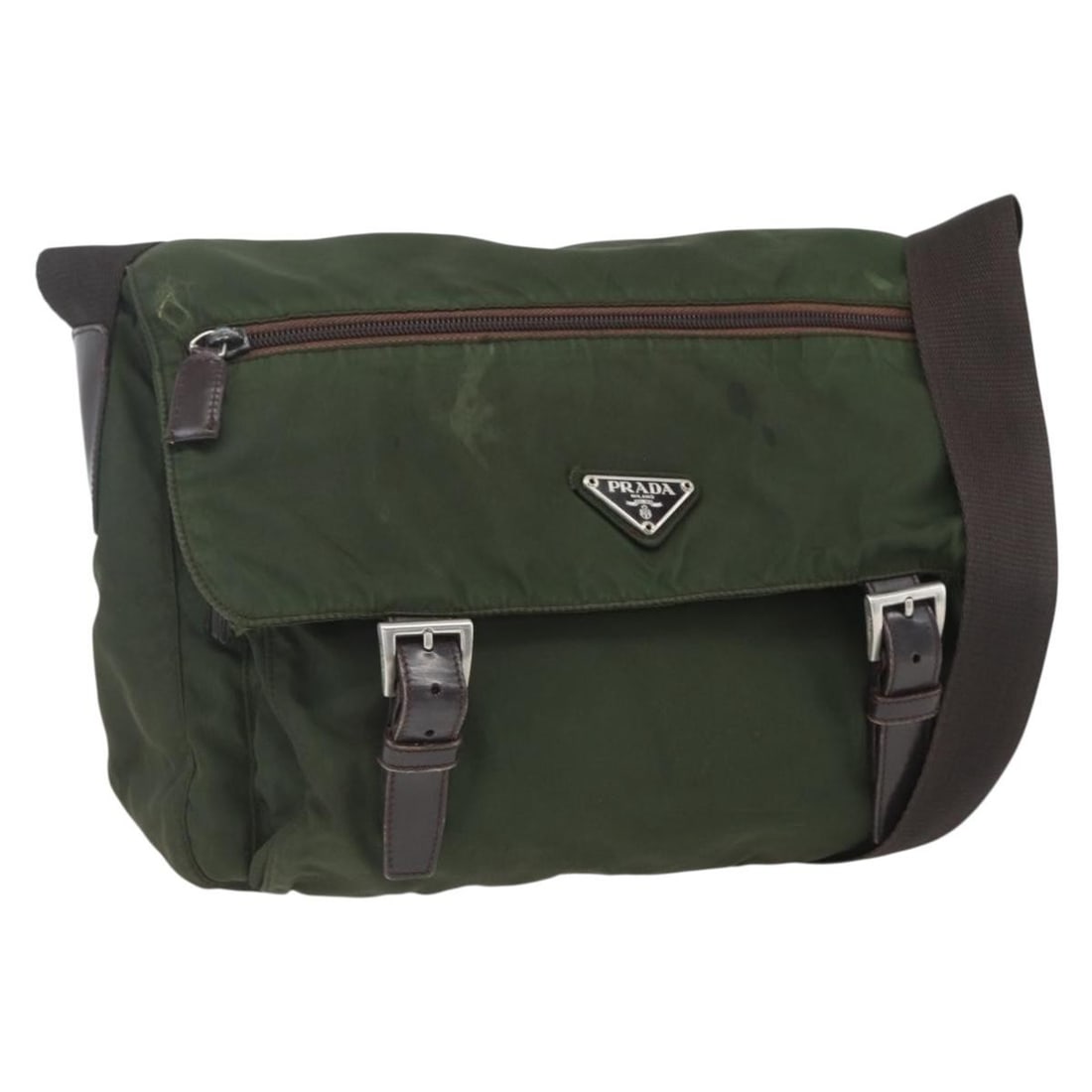 Green Nylon Prada Shoulder Bag with Silver Tone Accents: Green Nylon Prada Shoulder Bag with Silver Tone Accents This PRADA shoulder bag features a green and silver nylon exterior with silver-tone hardware. Made in Italy, the bag includes an adjustable shou