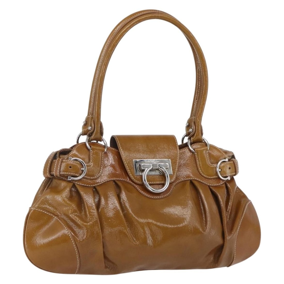 Brown Patent Leather Gancini Handbag by Salvatore Ferragamo Silver Accents: Brown Patent Leather Gancini Handbag by Salvatore Ferragamo Silver Accents This Salvatore Ferragamo Gancini hand bag is crafted from brown patent leather with silver-tone accents. Made in Italy, this