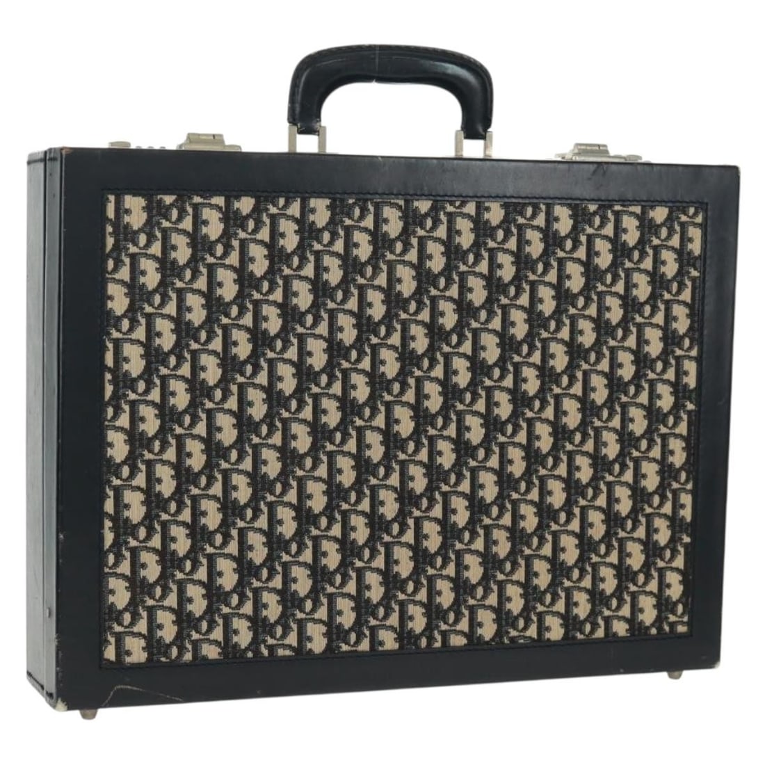 Dior Trotter Canvas Navy and Silver Attache Trunk Case: Dior Trotter Canvas Navy and Silver Attache Trunk Case This Christian Dior attache case features the iconic Trotter canvas in navy and silver tones. Made in France, this trunk-style case is designed w