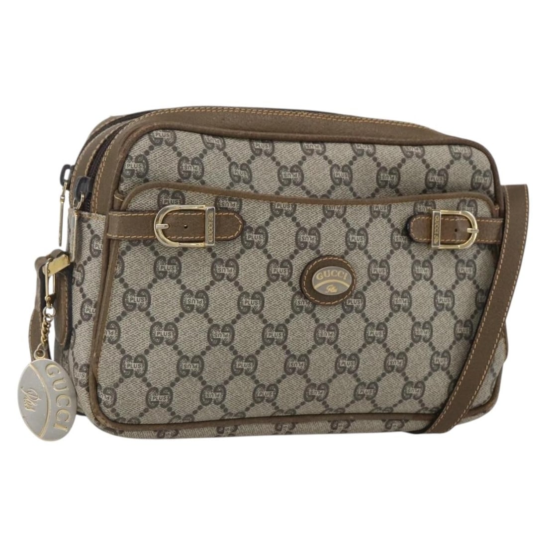 GUCCI GG Plus Supreme Beige Gold Shoulder Bag PVC Leather Auth Italy: GUCCI GG Plus Supreme Beige Gold Shoulder Bag PVC Leather Auth Italy This GUCCI GG Plus Supreme Shoulder Bag is an elegant accessory that showcases a combination of beige PVC leather and GG canvas. Cr