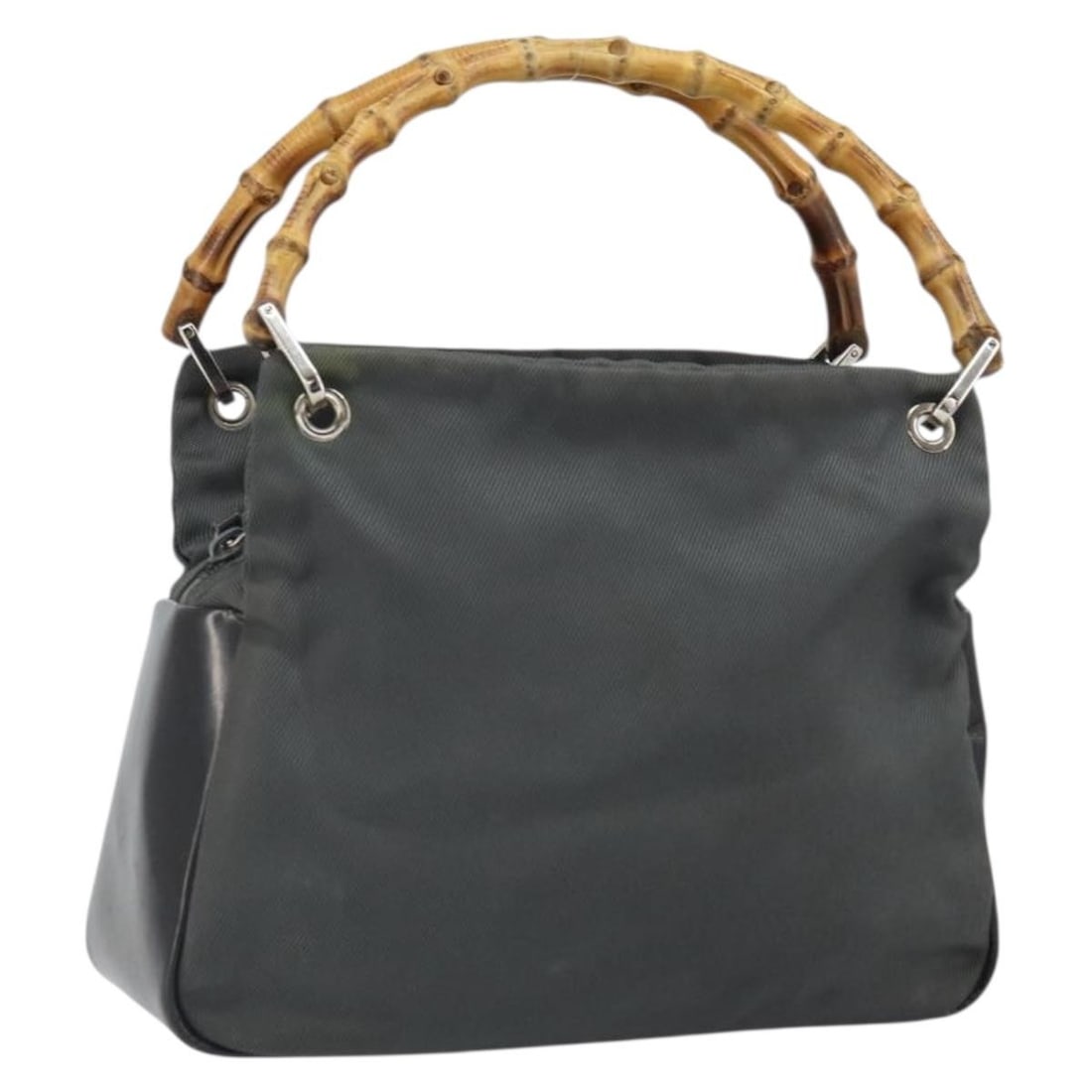 Gray Nylon Gucci Bamboo Handle Handbag Model 000 1014 0575 Italy: Gray Nylon Gucci Bamboo Handle Handbag Model 000 1014 0575 Italy This is a Gucci Bamboo hand bag crafted from gray and silver nylon. The bag features bamboo handles and silver-tone details, with a com