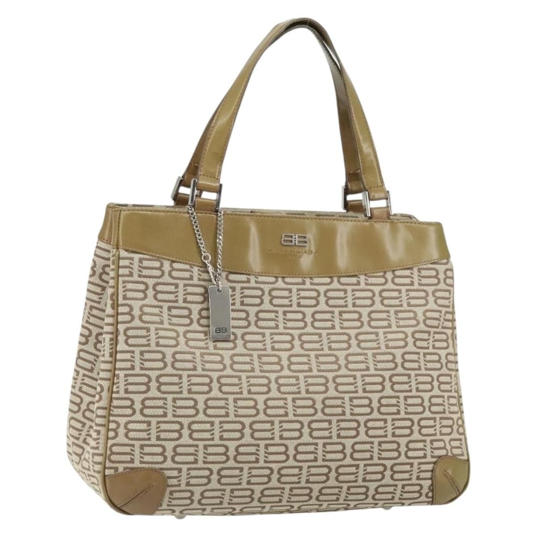 Balenciaga Canvas Beige and Silver Handbag from Italy: Balenciaga Canvas Beige and Silver Handbag from Italy This Balenciaga hand bag features a beige and silver canvas exterior. The bag is heavily used, with noticeable signs of wear including out-of-shap