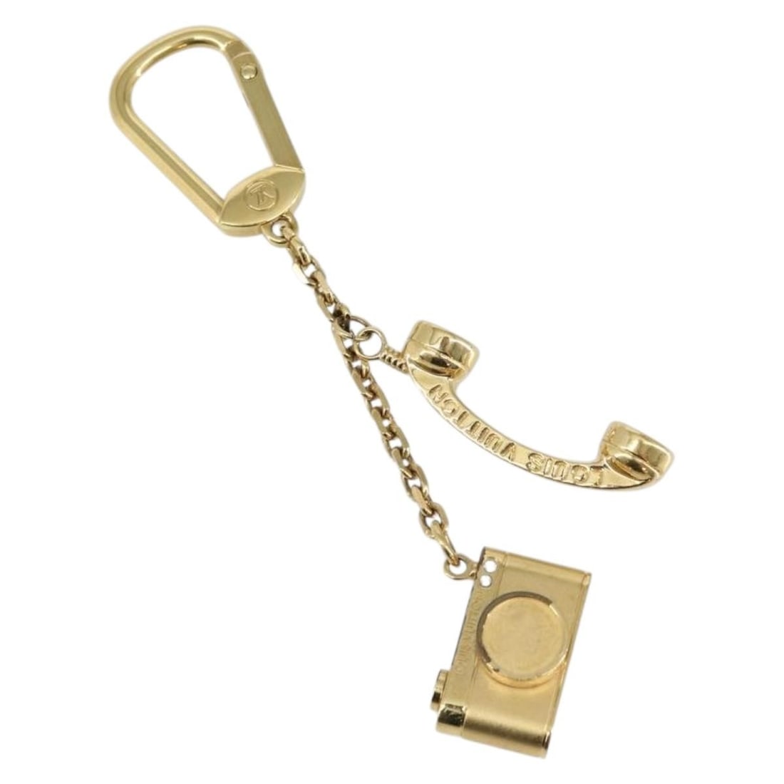 Louis Vuitton Gold Hollywood Charm M65382 Authentic: Louis Vuitton Gold Hollywood Charm M65382 Authentic This LOUIS VUITTON Porte Cles Hollywood Charm is a stylish accessory crafted from metal and finished in a luxurious gold color. It features a charmi