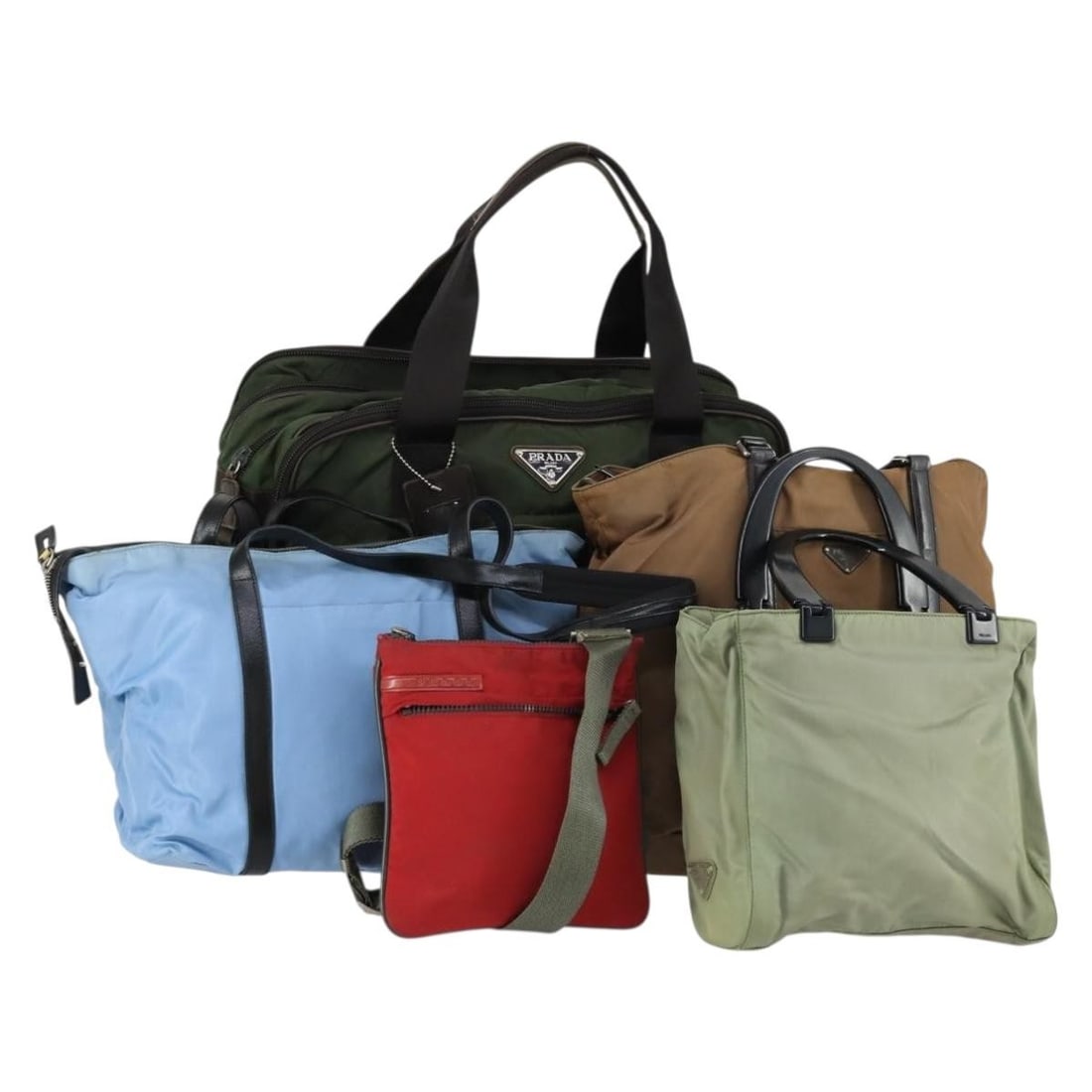 Set of 5 Prada Nylon Handbags in Blue Brown and Khaki: Set of 5 Prada Nylon Handbags in Blue Brown and Khaki This is an authentic PRADA handbag set crafted from nylon with a combination of blue, brown, and khaki colors. Made in Italy, this set includes fi