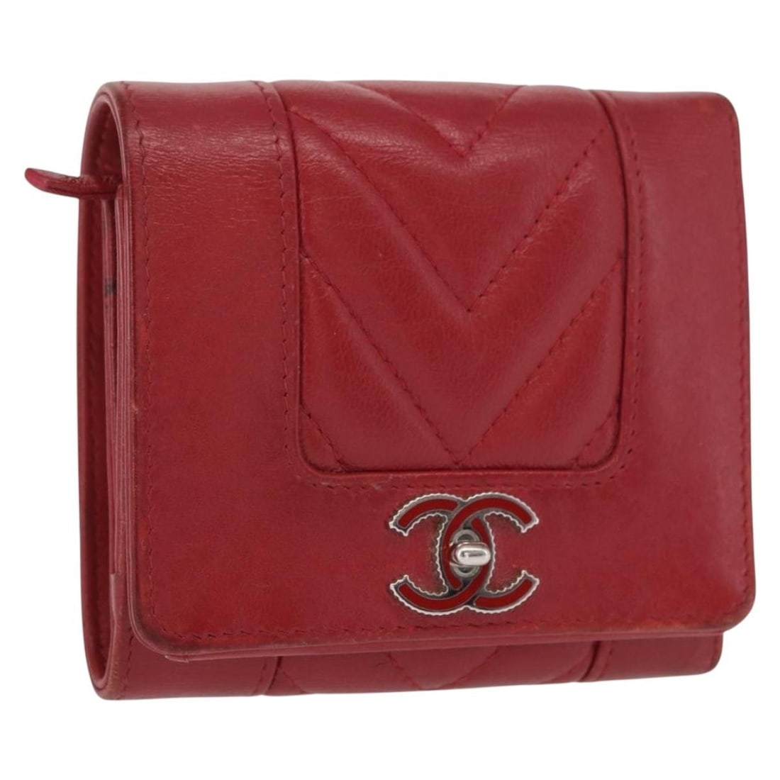 Red Lambskin Mademoiselle Matelasse Wallet by CHANEL with Silver CC Logo: Red Lambskin Mademoiselle Matelasse Wallet by CHANEL with Silver CC Logo This CHANEL Matelasse Mademoiselle wallet is crafted from luxurious lambskin leather in a striking red color with silver-tone C