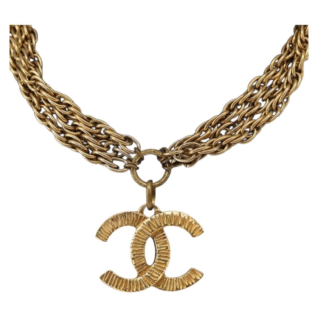 CHANEL Gold Tone CC Necklace Made in France: CHANEL Gold Tone CC Necklace Made in France This exquisite CHANEL necklace features a striking gold tone metal finish, embodying the brand's luxurious aesthetic. Crafted in France, the necklace measur