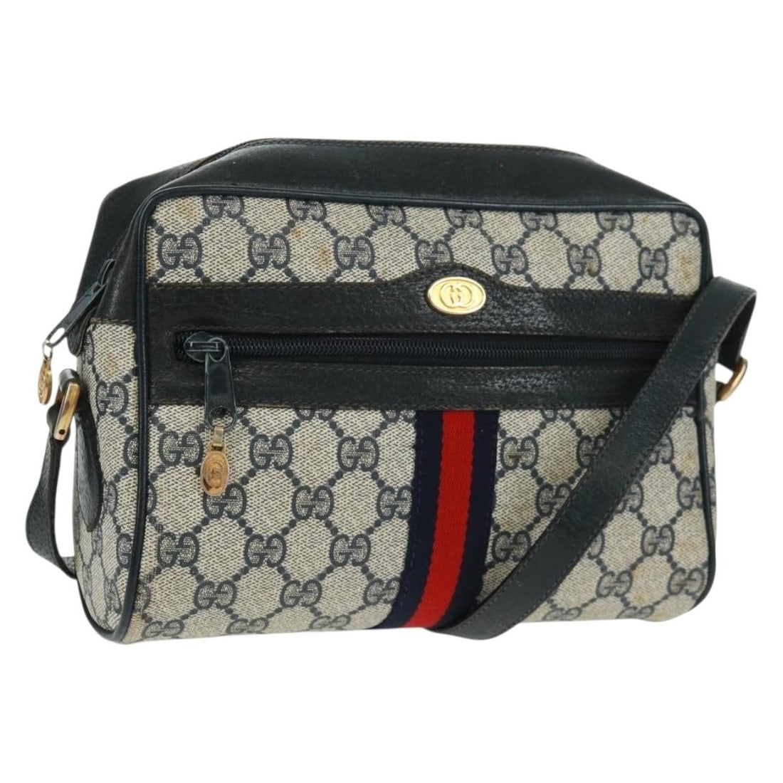 Navy and Red GG Supreme Sherry Line Shoulder Bag by Gucci PVC 56 02 004: Navy and Red GG Supreme Sherry Line Shoulder Bag by Gucci PVC 56 02 004 This GUCCI GG Supreme Sherry Line shoulder bag features a navy and red color scheme and is crafted from PVC leather with GG canv