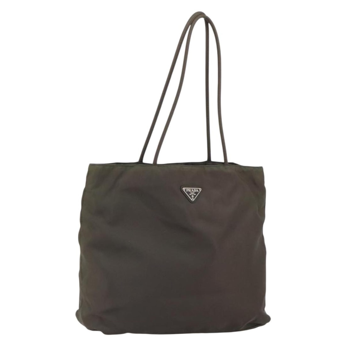Brown Nylon PRADA Tote Bag Silver Accents Made in Italy: Brown Nylon PRADA Tote Bag Silver Accents Made in Italy This Prada tote bag is crafted from brown nylon with silver-tone details. Made in Italy, it features a spacious interior and a practical design