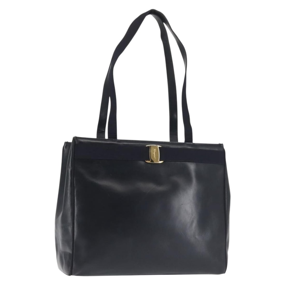 Salvatore Ferragamo Vala Tote Bag Leather Navy Gold Made in Italy: Salvatore Ferragamo Vala Tote Bag Leather Navy Gold Made in Italy This stylish Salvatore Ferragamo Vala Tote Bag showcases a luxurious leather exterior in a sophisticated navy and gold color combinati