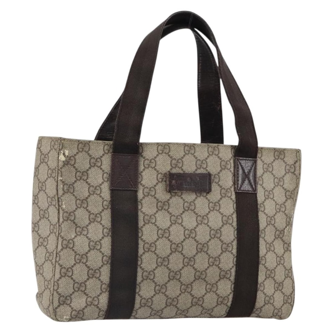 Beige Silver PVC GG Supreme Tote by Gucci 141976 Italy: Beige Silver PVC GG Supreme Tote by Gucci 141976 Italy This Gucci GG Supreme tote bag features a beige and silver color scheme and is crafted from durable PVC leather and GG canvas. The bag offers a s