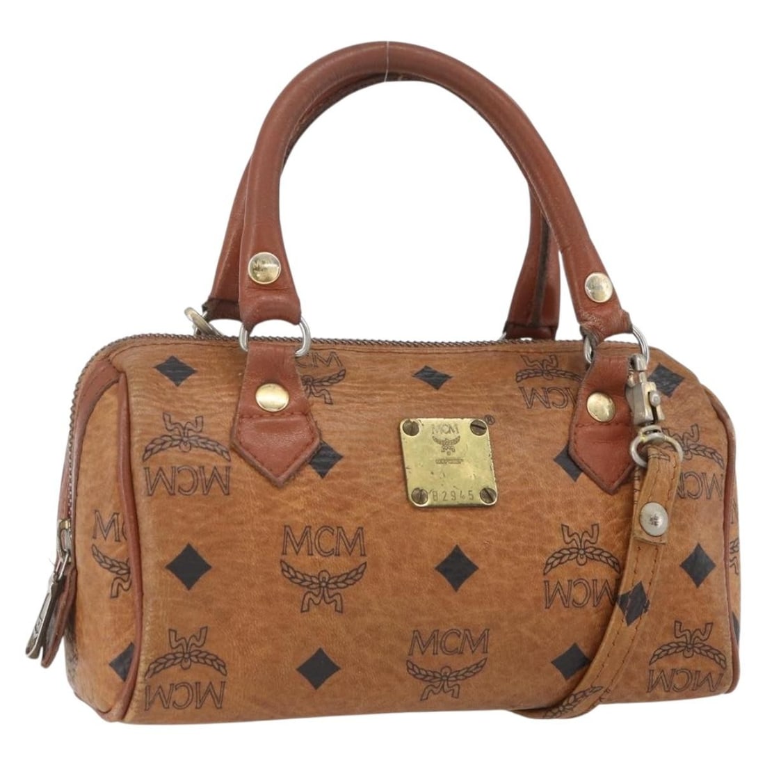 Mini Boston Bag by MCM Vicetos Logogram PVC Leather Brown Gold Two Way Style: Mini Boston Bag by MCM Vicetos Logogram PVC Leather Brown Gold Two Way Style This MCM Vicetos Logogram Mini Boston Bag features a brown and gold PVC leather exterior with both top handles and a detach