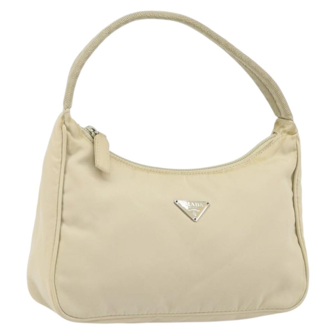 Ivory Nylon Handbag with Silver Accents by Prada Italy: Ivory Nylon Handbag with Silver Accents by Prada Italy This PRADA handbag is crafted from ivory nylon with silver-tone accents. Made in Italy, it features a compact design with a structured silhouette