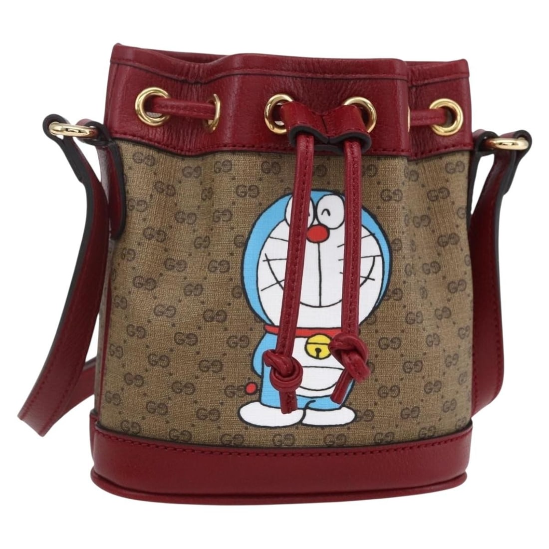 GUCCI Micro GG Supreme Doraemon Mini Bucket Bag Beige PVC Auth 647801: GUCCI Micro GG Supreme Doraemon Mini Bucket Bag Beige PVC Auth 647801 Elevate your accessory collection with the GUCCI Micro GG Supreme Doraemon Mini Bucket Bag. This stylish shoulder bag features a l