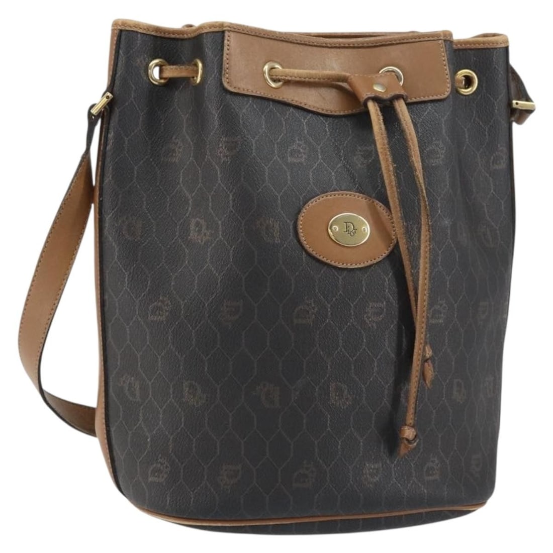 Black Honeycomb Canvas Shoulder Bag by Christian Dior PVC Gold Detail: Black Honeycomb Canvas Shoulder Bag by Christian Dior PVC Gold Detail This Christian Dior shoulder bag features the signature honeycomb canvas design in black and gold PVC leather. Designed with a spa