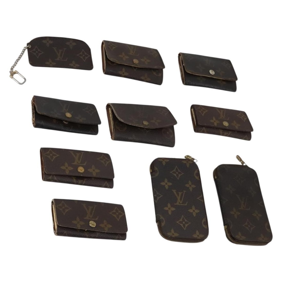 LOUIS VUITTON Monogram Key Case Set 10 with Authenticity: LOUIS VUITTON Monogram Key Case Set 10 with Authenticity Discover the LOUIS VUITTON Monogram Key Case, a stylish and practical accessory crafted from high-quality Monogram Canvas. This key case featur