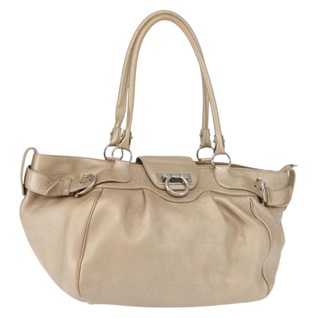 Salvatore Ferragamo Gancini Marissa Beige Leather Tote Bag: Salvatore Ferragamo Gancini Marissa Beige Leather Tote Bag This Salvatore Ferragamo Gancini Marissa Tote Bag combines elegance and practicality, crafted from high-quality leather in a sophisticated be