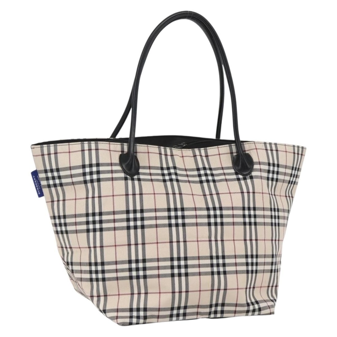 Nylon Beige Tote with Nova Check Blue Label by Burberry: Nylon Beige Tote with Nova Check Blue Label by Burberry This BURBERRY Nova Check Blue Label tote bag features a beige and silver nylon exterior with a classic check design. The bag is made in Japan an