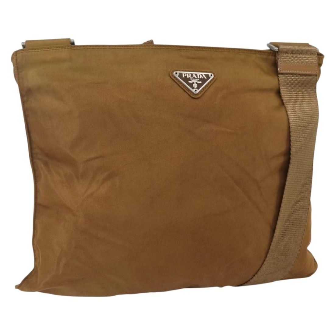 Brown Nylon Prada Shoulder Purse with Silver Accents from Italy: Brown Nylon Prada Shoulder Purse with Silver Accents from Italy This PRADA shoulder bag is crafted from brown nylon with silver-tone accents. Made in Italy, the bag features a spacious design with an