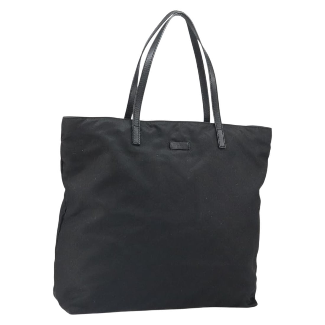 Black and Gold Nylon GG Canvas Tote by Gucci Model 295252: Black and Gold Nylon GG Canvas Tote by Gucci Model 295252 This GUCCI GG Canvas tote bag features a black and gold color scheme and is crafted from durable nylon and signature GG canvas. The bag includ