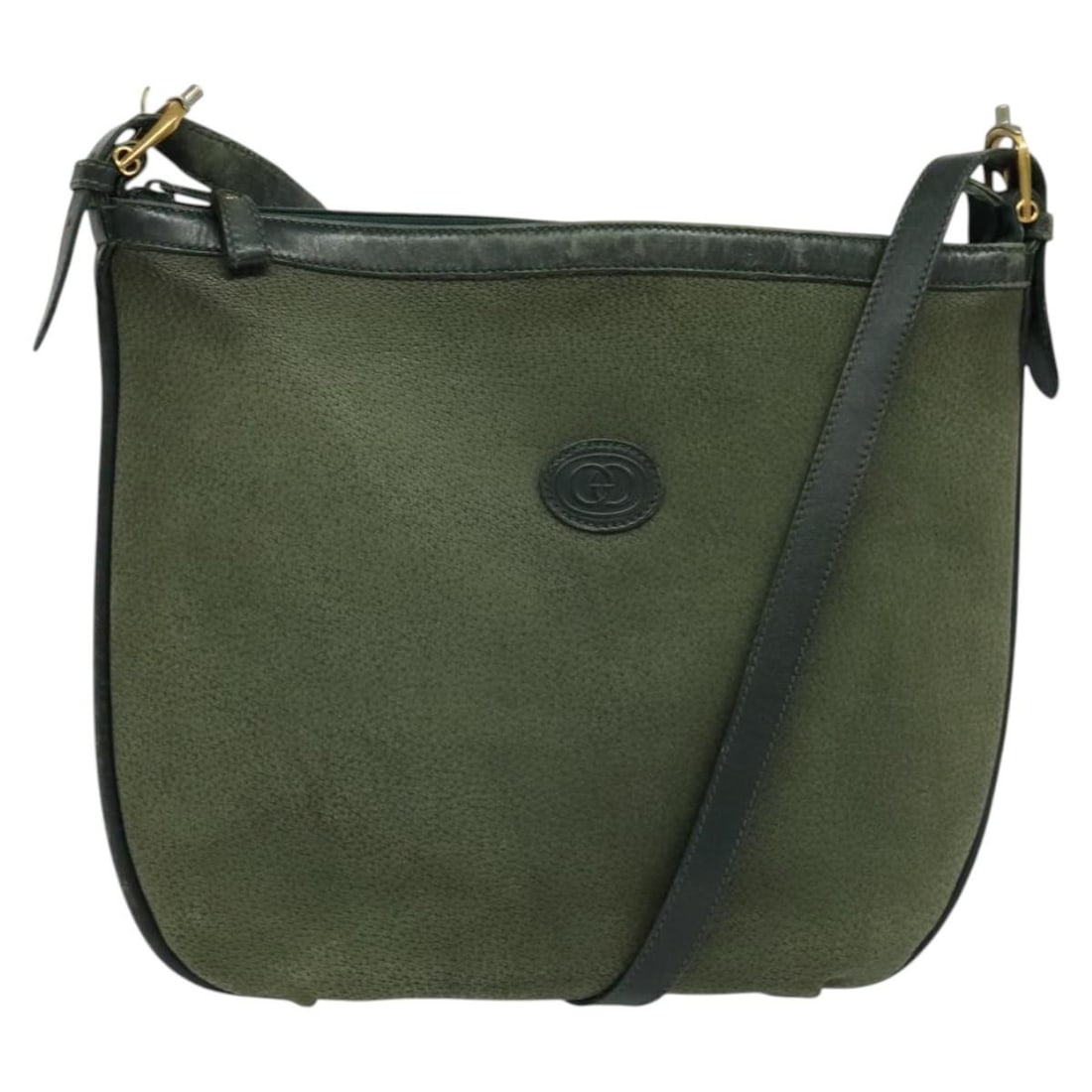 Green and Gold Leather Gucci Shoulder Bag Made in Italy: Green and Gold Leather Gucci Shoulder Bag Made in Italy This GUCCI shoulder bag features a green and gold leather exterior and is made in Italy. The bag has a structured silhouette with approximate di