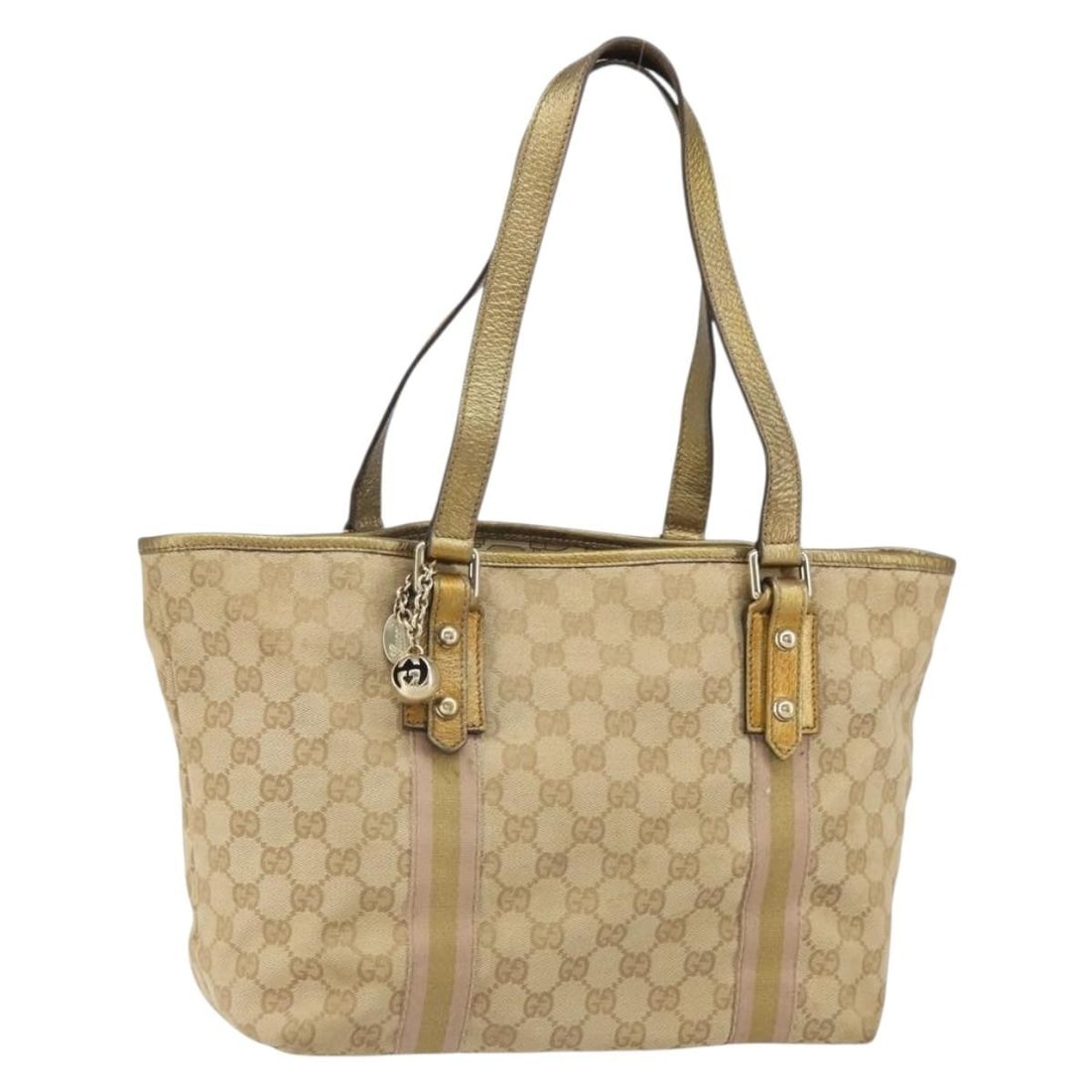 Beige Gold GG Canvas Gucci 137396 Shoulder Bag with Charm: Beige Gold GG Canvas Gucci 137396 Shoulder Bag with Charm This Gucci GG Canvas hand bag features a beige and gold color scheme with complementary colored leather accents. The bag includes a charm acce