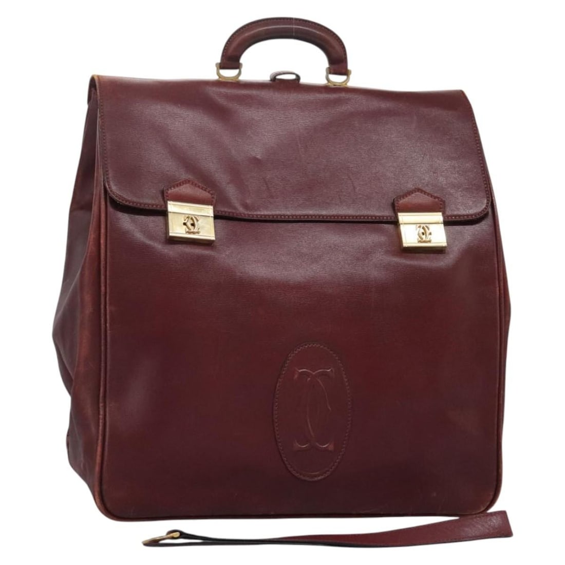 CARTIER Must Line Wine Red Leather Hand Bag 2way Gold Accents: CARTIER Must Line Wine Red Leather Hand Bag 2way Gold Accents This Cartier Must Line Hand Bag is a stunning accessory crafted from high-quality leather, featuring an elegant wine red and gold color co