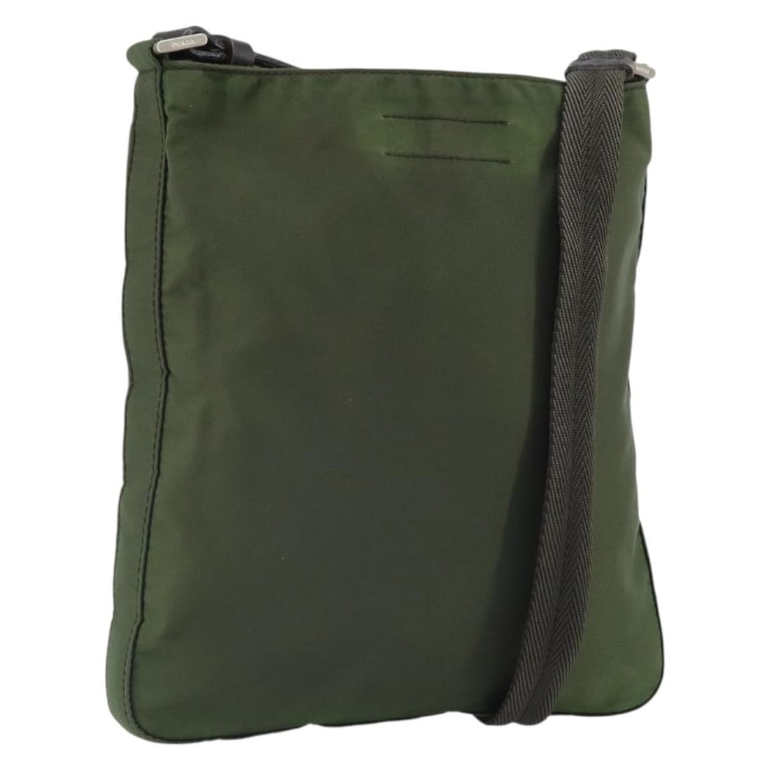 Prada Khaki Nylon Shoulder Purse with Silver Details Made in Italy: Prada Khaki Nylon Shoulder Purse with Silver Details Made in Italy This PRADA shoulder bag features a khaki nylon exterior with silver accents. Made in Italy, the bag offers a compact and practical de