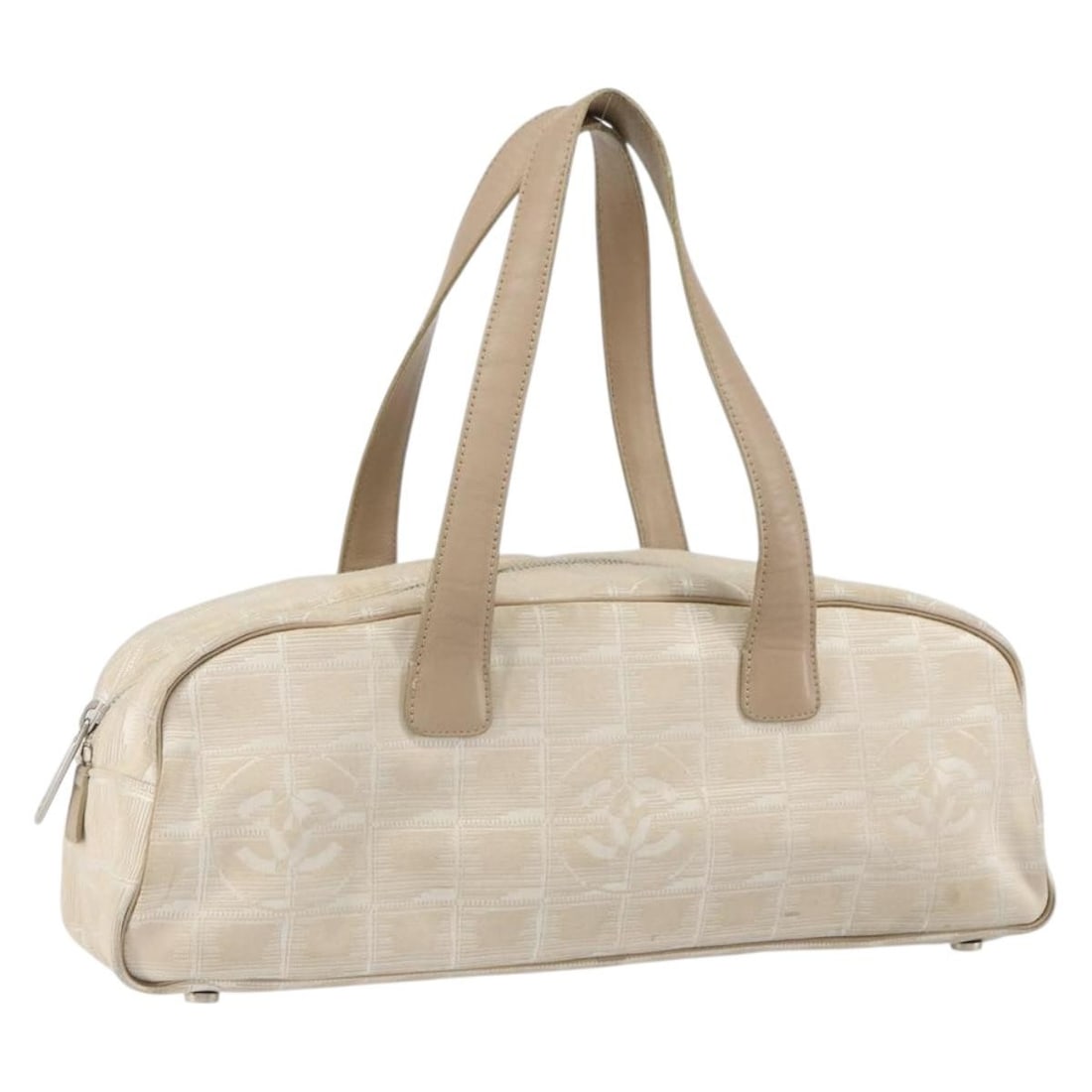 Chanel New Travel Line Beige Nylon Handbag with Silver CC Italy: Chanel New Travel Line Beige Nylon Handbag with Silver CC Italy This CHANEL New Travel Line hand bag features a beige and silver nylon exterior with signature CC accents. Made in Italy, it offers a pr