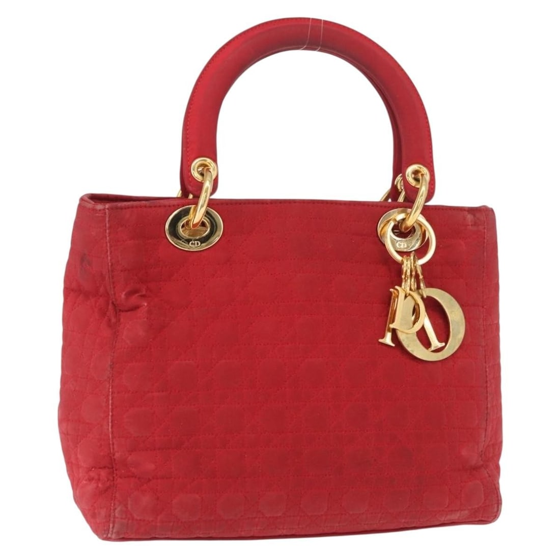 Red Nylon Canage Handbag by Christian Dior with Gold Tone Details: Red Nylon Canage Handbag by Christian Dior with Gold Tone Details This Christian Dior Cannage hand bag features a red and gold nylon exterior and includes a decorative charm. Manufactured in Italy, th