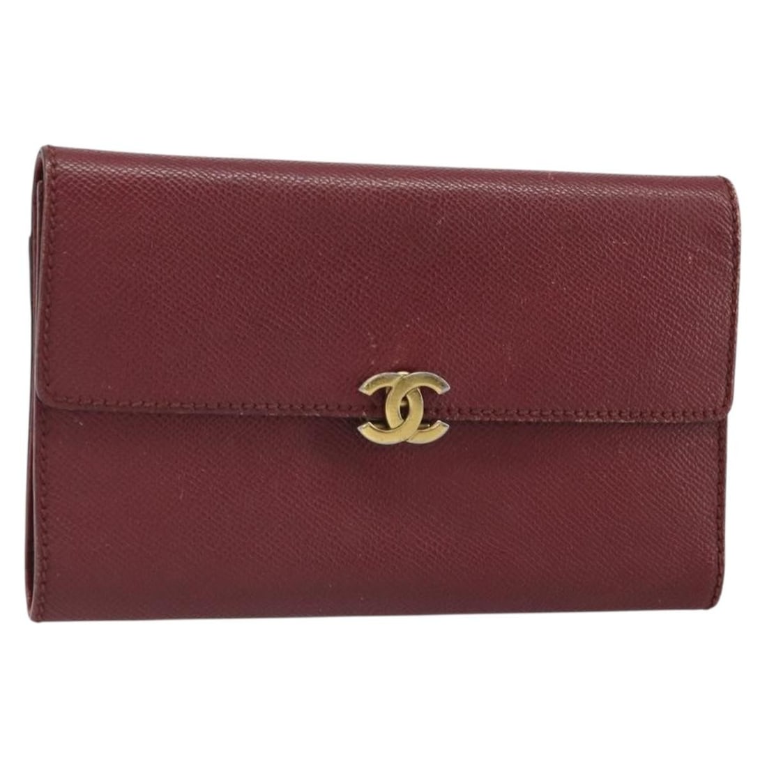 Red Leather Wallet by CHANEL with Gold CC Logo: Red Leather Wallet by CHANEL with Gold CC Logo This CHANEL wallet features red leather with gold-tone accents and the iconic CC logo. Made in Italy, it offers a compact and stylish design with multipl