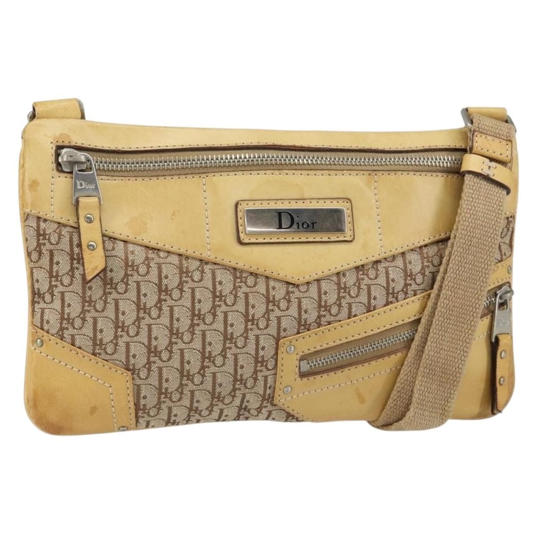 Beige Silver Christian Dior Trotter Canvas Street Chic Shoulder Bag Italy: Beige Silver Christian Dior Trotter Canvas Street Chic Shoulder Bag Italy This Christian Dior Trotter Canvas Street Chic shoulder bag features a beige and silver color scheme with signature Trotter ca