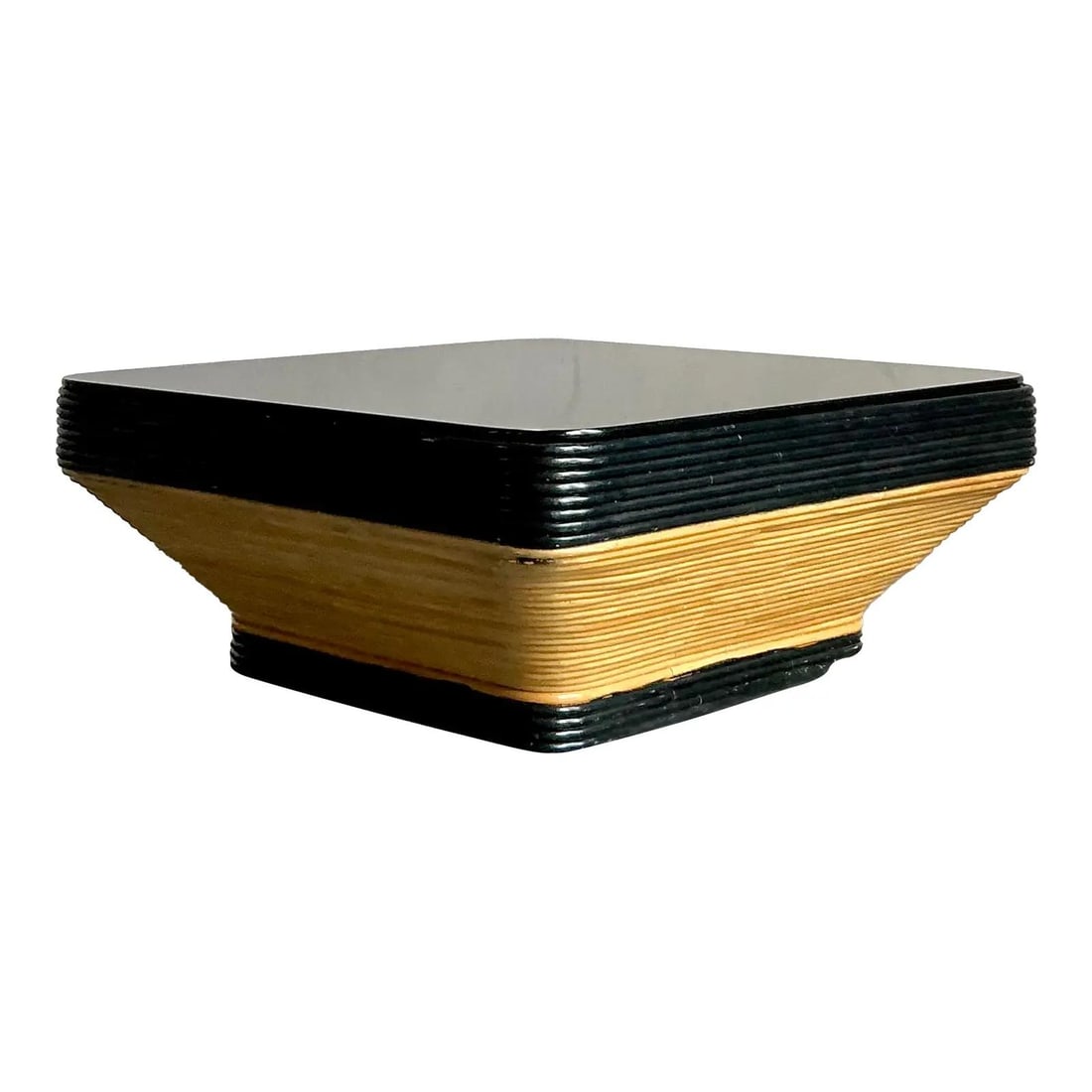 Square Pencil Reed Rattan Coffee Table with Black Glass Top 40" Mid Century Modern: Square Pencil Reed Rattan Coffee Table with Black Glass Top 40" Mid Century Modern This vintage coffee table showcases a striking Mid-Century Modern aesthetic with bold tropical textures and contrasti